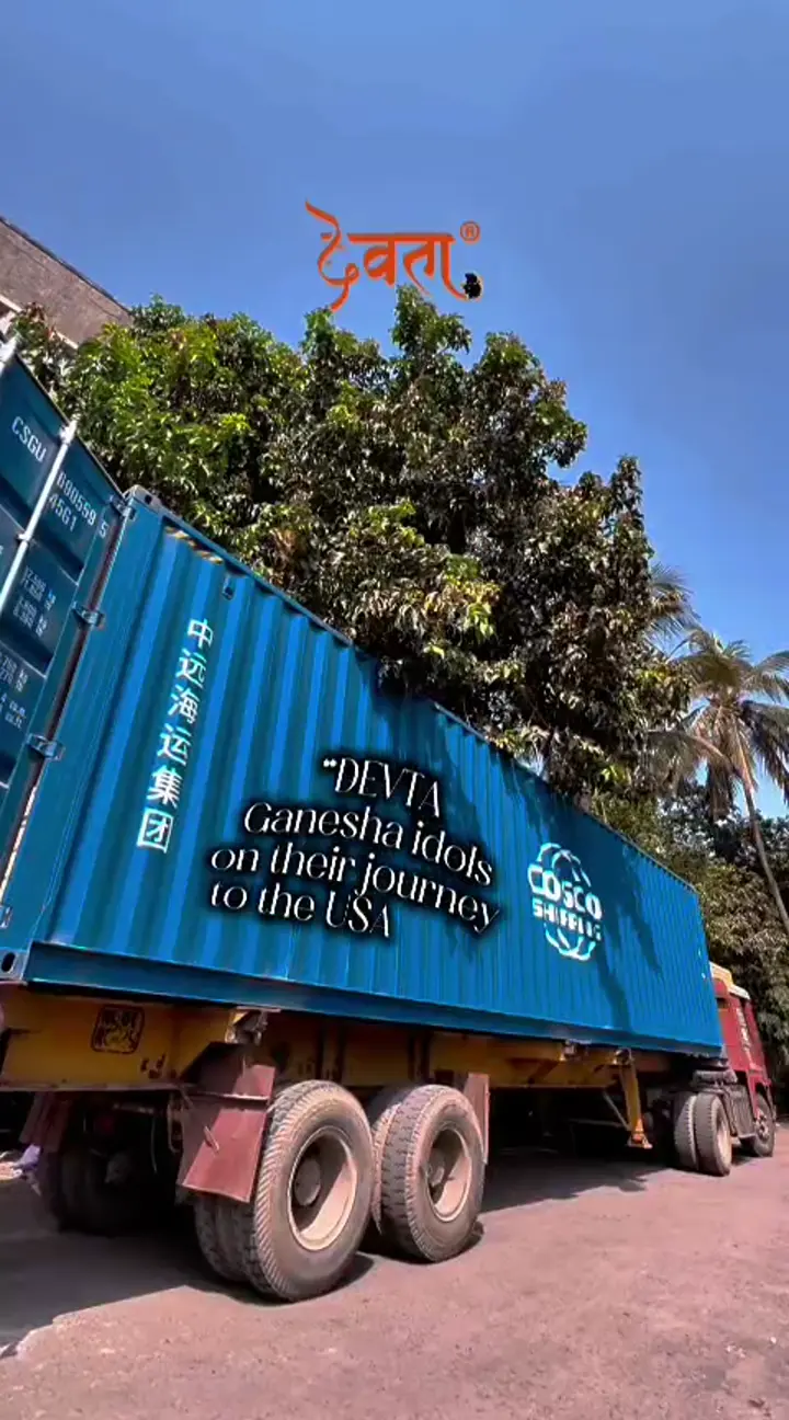 Loading fumigated wood crates of Devta Ganpati onto export cargo